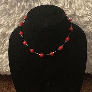 Red and silver necklace and earrings